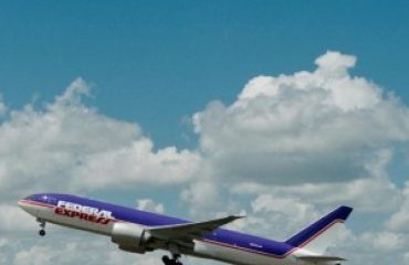 FedEx 777 in retro livery lands at Memphis airport renamed for Fred Smith